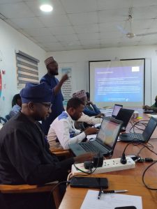 Nigerians eating local foods while health experts warn about food safety and preventable diseases