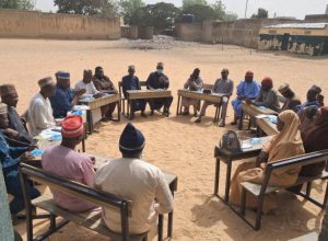 Nigerians eating local foods while health experts warn about food safety and preventable diseases