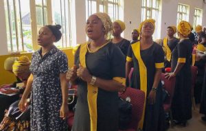 Nigerians eating local foods while health experts warn about food safety and preventable diseases