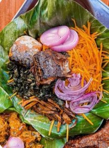 Nigerians eating local foods while health experts warn about food safety and preventable diseases