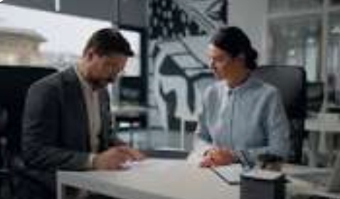 Business partners discussing product quantity before signing a contract.